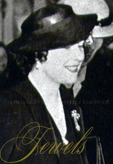 rothschild diamond watch with 3 bows and 12 diamonds